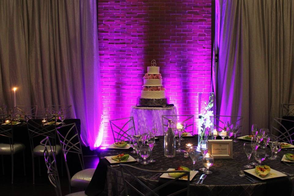 Accent lighting to highlight the cake table.