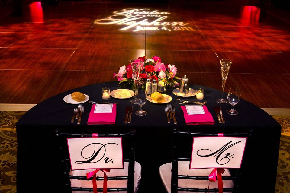 Kristen & Steve's sweetheart table- Beautifully designed by Proud to Plan & Petals Lane- Lighting & entertainment by Synergetic Sounds