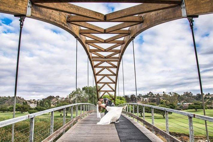 Newlyweds dip on bridge