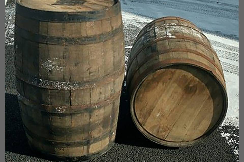 Full size wine barrels. Available to rent for $75.00. Place the two together with our custom fit wood top and you have a bar, desert table, appetizer table or a table for any purpose.