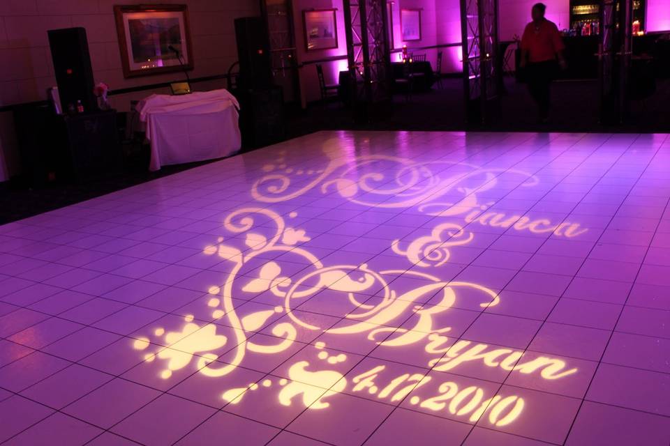 Name in lights enhancement. Customizable logo of you and your husbands name, wedding date, intials, etc.. shining anywhere you want in the event space.