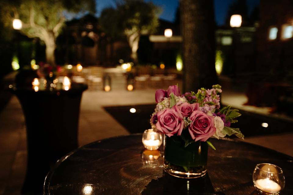 Candlelit cocktail tables | Linens: La Tavola Photographer: Michelle Walker Florals: Beau Fleurs Venue: Hotel Yountville