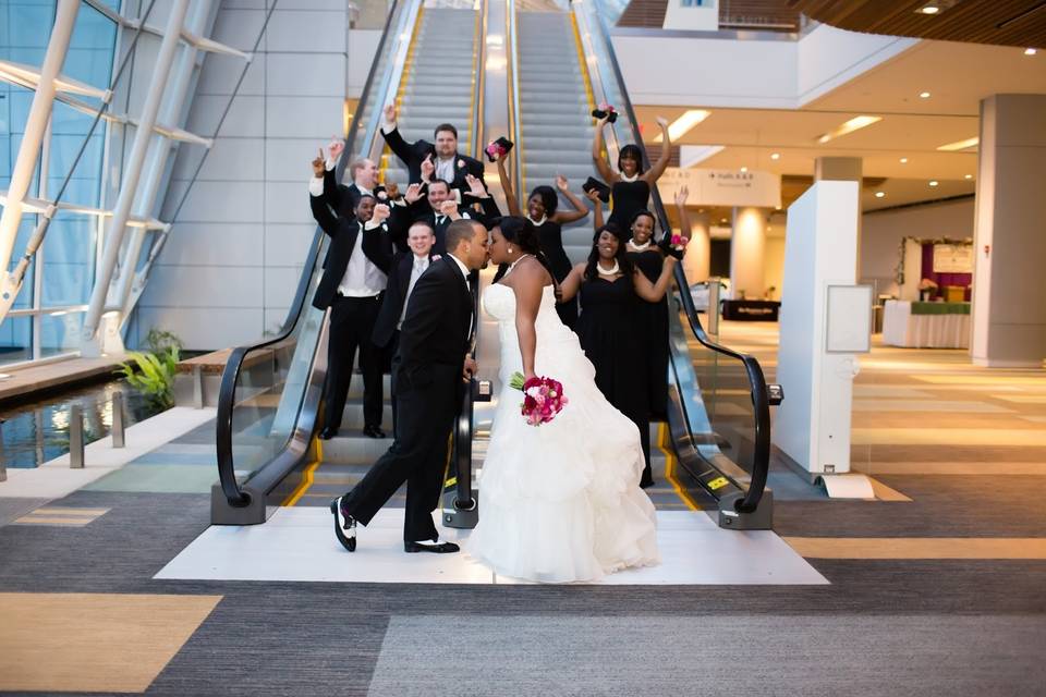 Newlyweds by the escalator