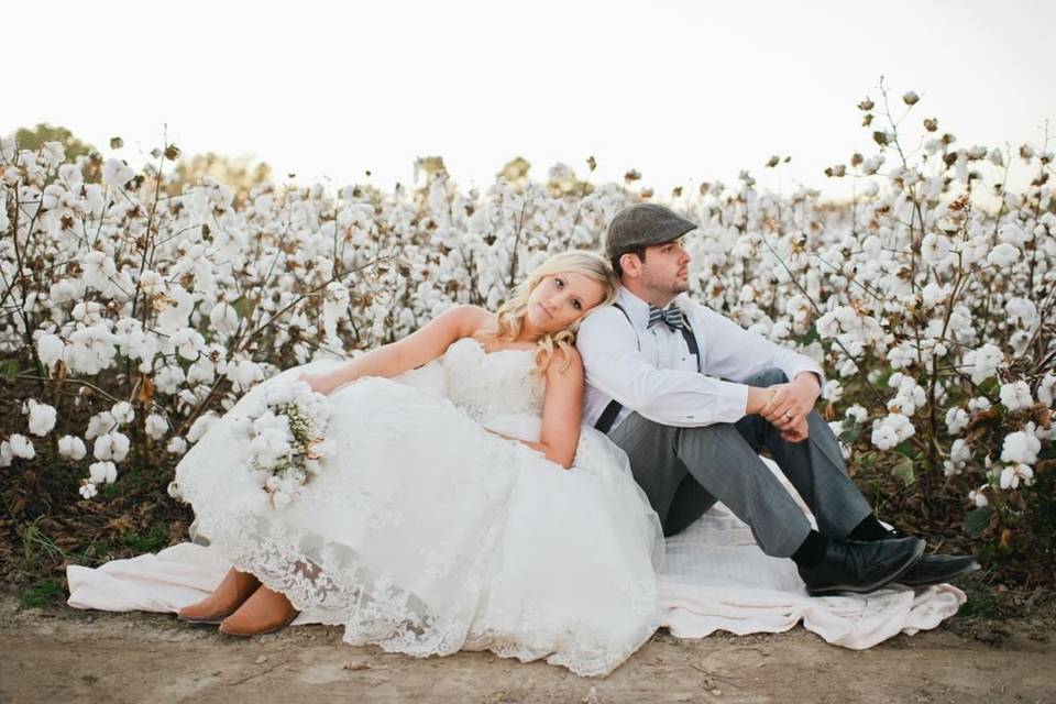 Laura & Ryan in a cotton field