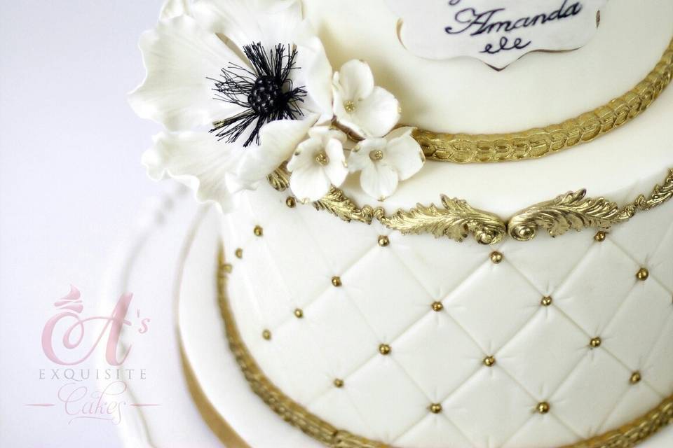 White and gold wedding cake