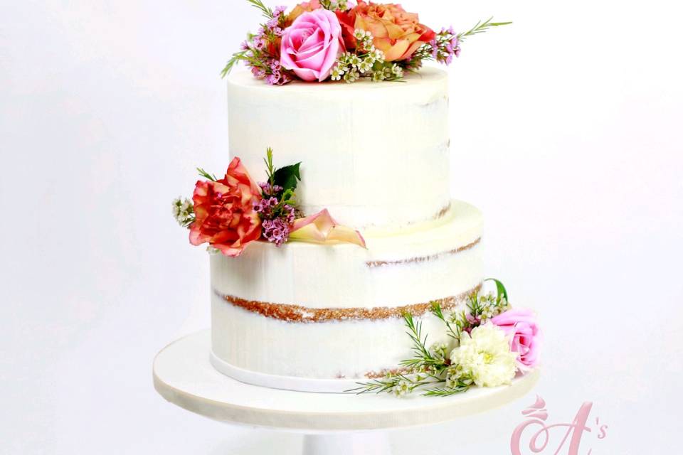 Naked wedding cake with flowers