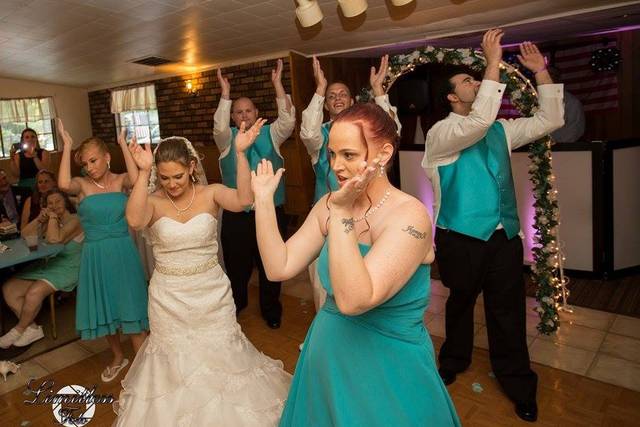 Bride and guests dancing