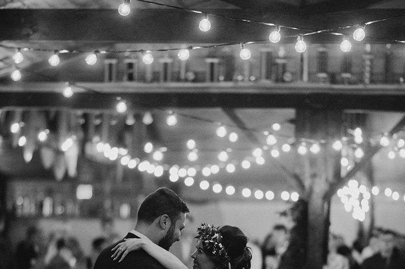 First dance beneath fairy lights