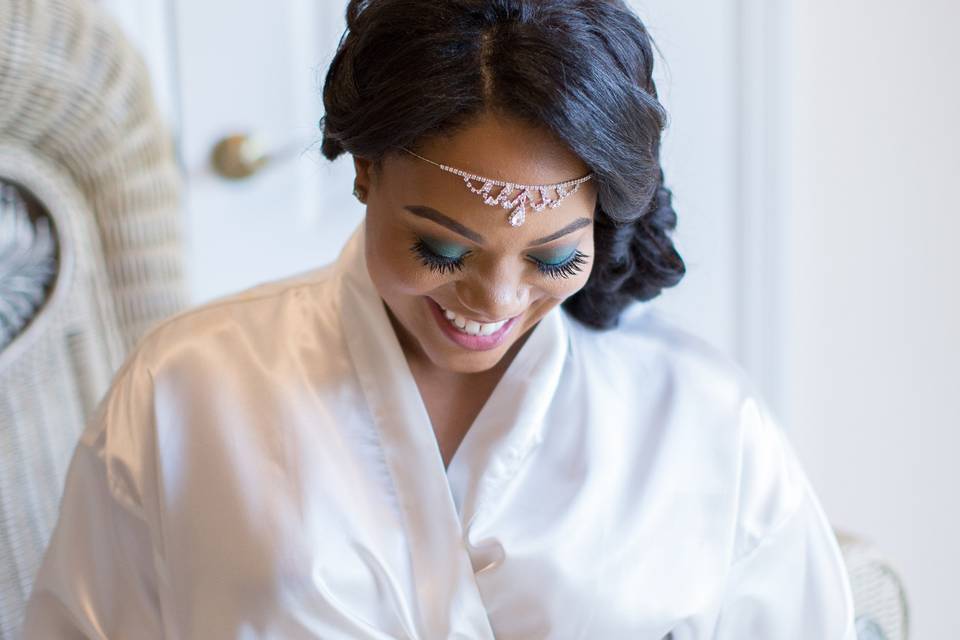 Bride white satin robe, pearls and diamond head dress, eyelashes, eyeshadow