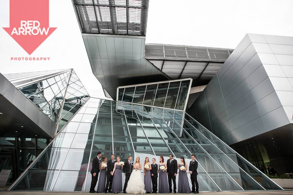 The couple with the bridesmaids and groomsmen