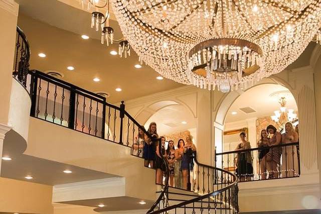 Newlyweds by the staircase