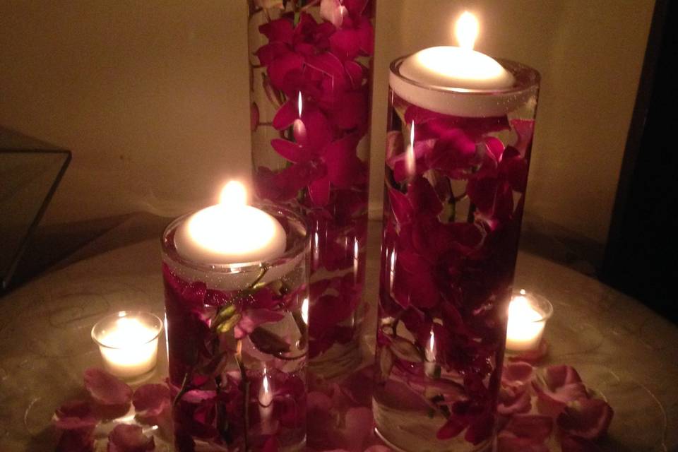 Multiple candle floral pieces