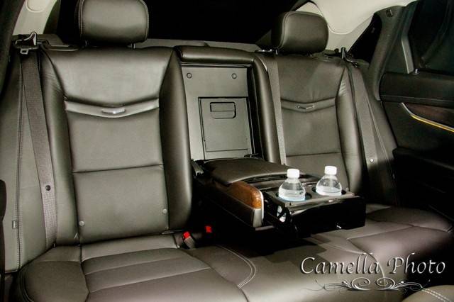 EL4 Black Cadillac XTS Sedan •Seats up to 4 Passengers •	http://www.exceedlimo.com/Vehicles