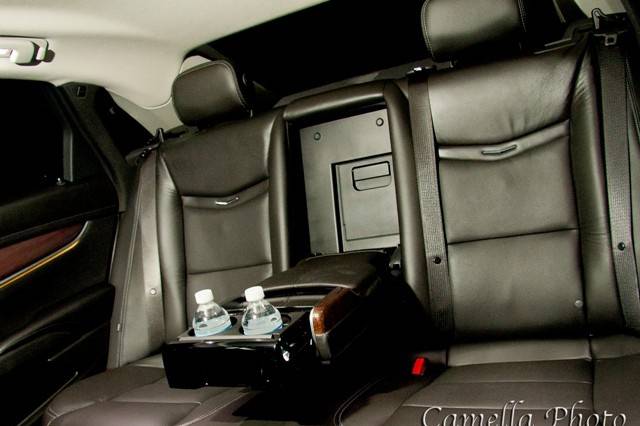 EL4 Black Cadillac XTS Sedan •Seats up to 4 Passengers •	http://www.exceedlimo.com/Vehicles