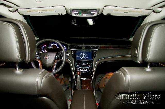 EL4 Black Cadillac XTS Sedan •Seats up to 4 Passengers •	http://www.exceedlimo.com/Vehicles