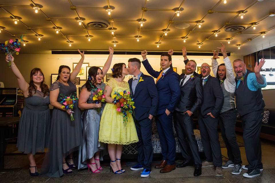 Newlyweds and their wedding party