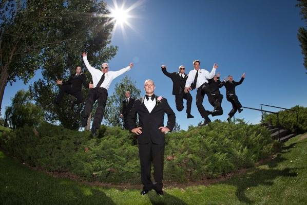 Groomsmen Jumping Over and Toward Groom