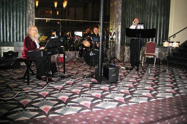 Jazz-Plus Trio playing in Grand Ballroom of Hilton Netherland Plaza in Cincinnati OH for Corporate Function.