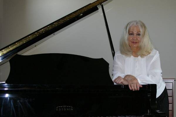 Phyllis Lynch at her Grand Piano