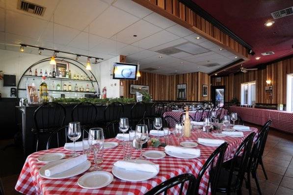 Grimaldi's Famous Rockefeller Room has a fully stocked granite bar and flat screen TV.