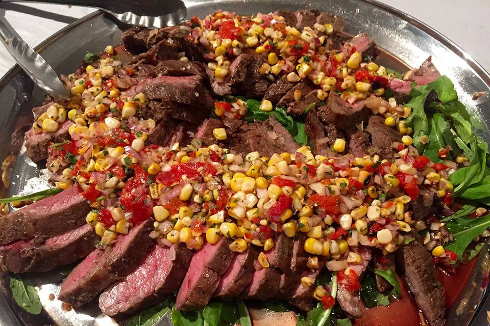 Steak with corn and tomato salsa