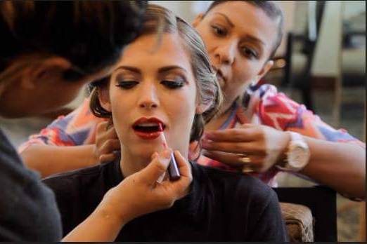 Bride with makeup artists