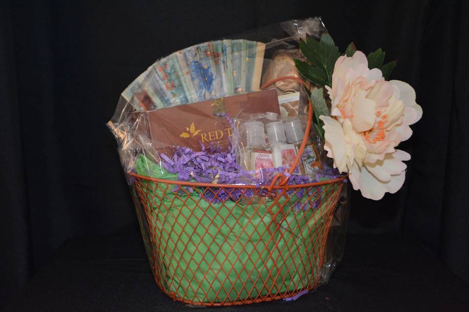 Spa basket with a box of Organo Gold Red Tea