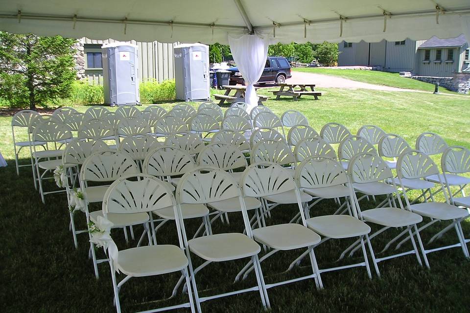 Covered outdoor wedding setup