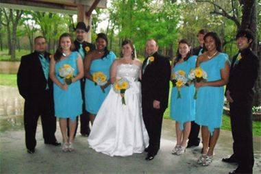 The couple with the bridesmaid