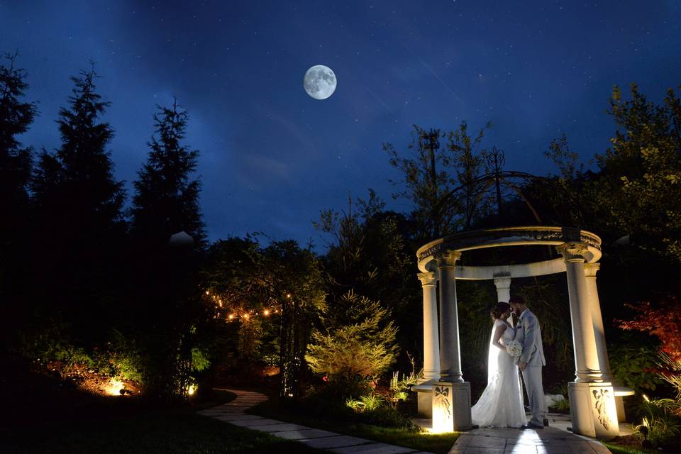 Couple beneath a full moon - Russell's Photography Studio