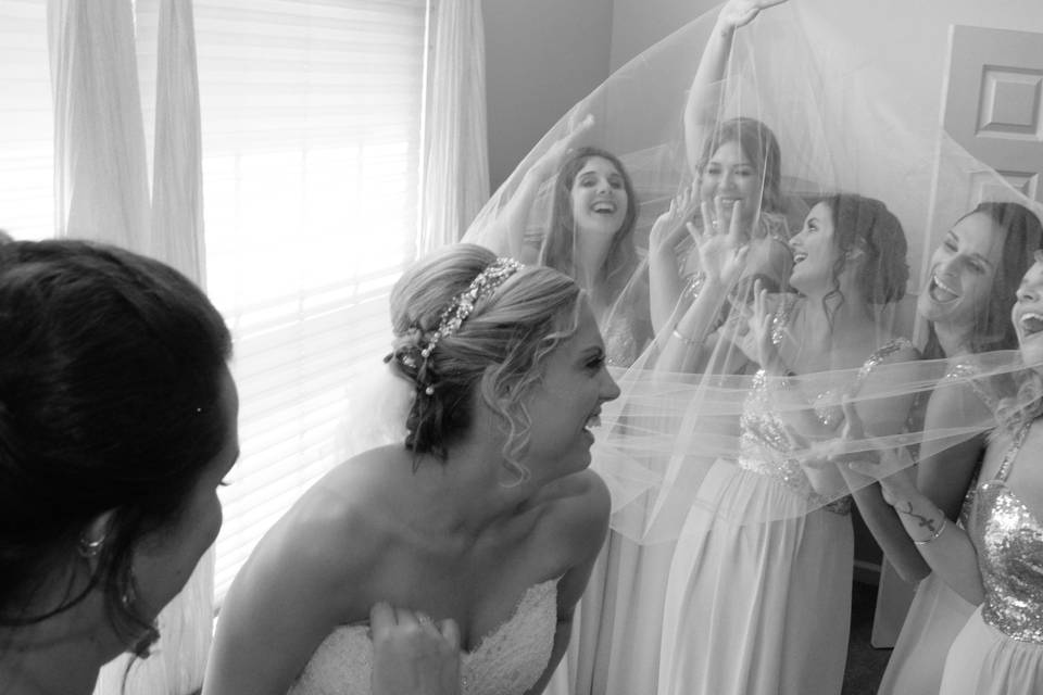 Bridal party under the veil - Russell's Photography Studio