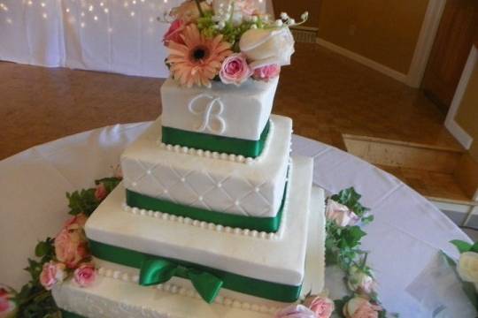 Square cake design with lots of pretty fresh flowers!