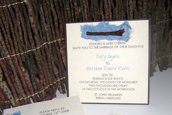 The Branch
Yes, that is correct an actual tree branch will be included in this invitation. The invitation is printed on cream cardstock and bordered with a dark brown cardstock. On the top of the invitation will be a small piece of torn blue mulberry handmade paper with a small *tree branch over the handmade paper. (*As with handmade papers, tree branches may vary slightly in size and color.)