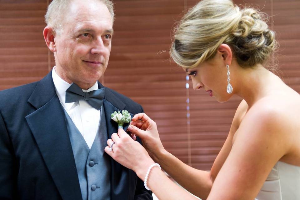 Pinning the boutonniere