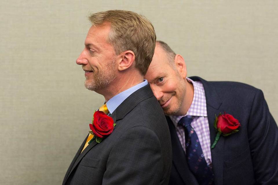 After 18+ years together and the fight/right to marry finally won — in some states, anyway….arghh! — Craig and John were joined by friends and family members at the Office of the City Clerk as they tied the knot. Congratulations, gentleman!