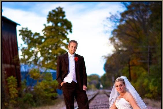 Bride and groom at railroad tracks in Greenwood, Indiana.