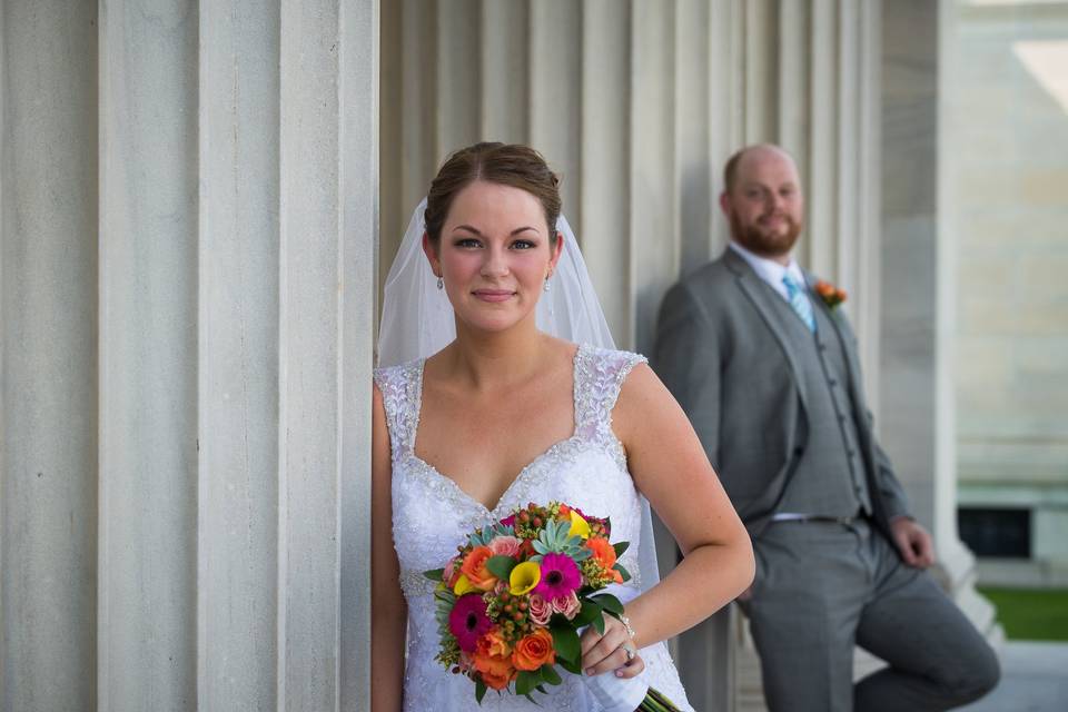 Bride with groom behind her
