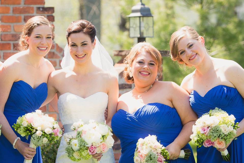 Bridesmaids in blue with the bride