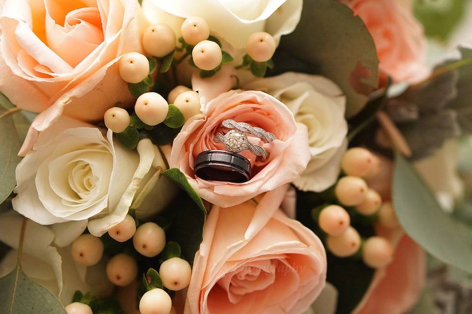 Wedding bands on the flowers