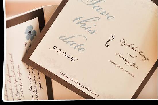 A uniquely elegant card to let guests mark their calendars for an upcoming event. This Save the Date card says it simply with light blue script on shimmer ivory cardstock, double layered with brown cardstock.