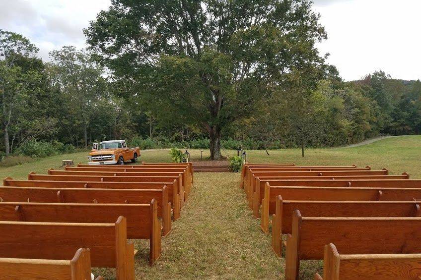 Rustic church pews and 1957 f100 vol pickup