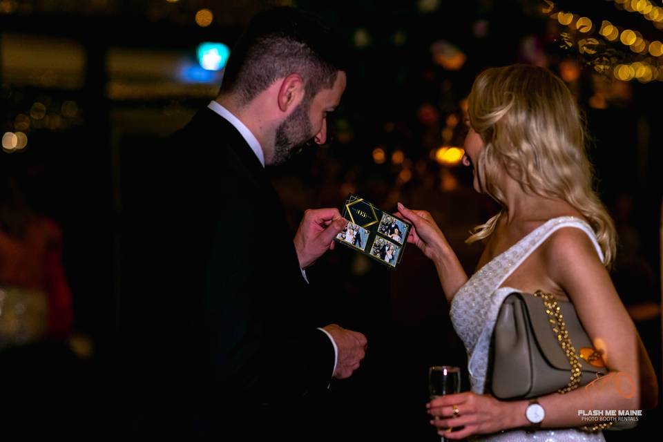 Guests using a photo booth