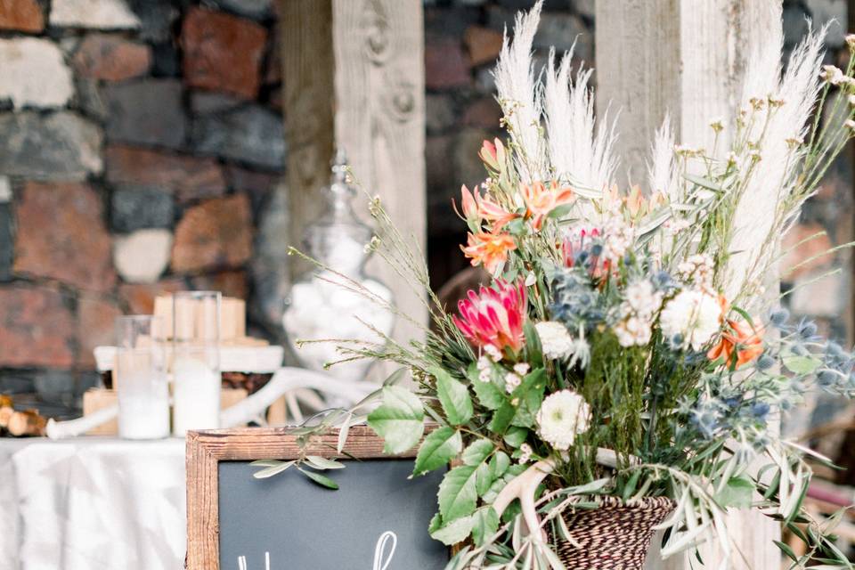 Welcome sign and floral