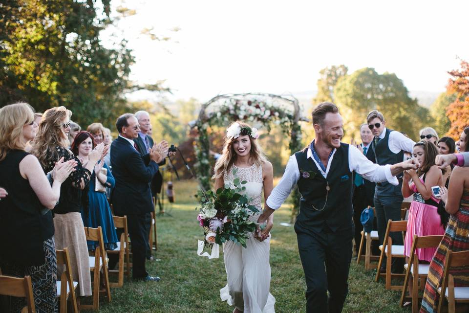 Guests cheering for the newly weds