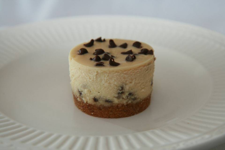 Bailey's Chocolate Chip Cheesecake - Creamy Bailey's Cheesecake with mini chocolate chips throughout, finished with a traditional crust. Can also be finished with a chocolate crust