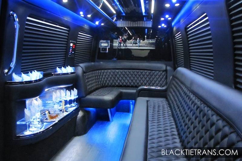 Black Tie offers brand new custom-built Mercedes Limousine Sprinters. Get the prestige of a limousine, but with the added benefits of full head room while standing, easy vehicle access through a massive door, smoother ride and superior maneuvering. The Mercedes Limousine Sprinter features plush leather wrap around seating, hardwood flooring, ambient lighting and complimentary beverage bar for a more social and luxurious atmosphere. Comes fully loaded with surround sound, 2 TV monitors, 2 touchscreen control panels, USB and electrical outlets, and safety belts for seating up to 10 passengers comfortably. Enjoy the illuminated bar with complimentary liquor, champagne, ice, sodas and water.