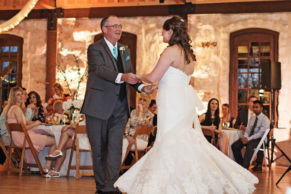 Bride and guest dancing