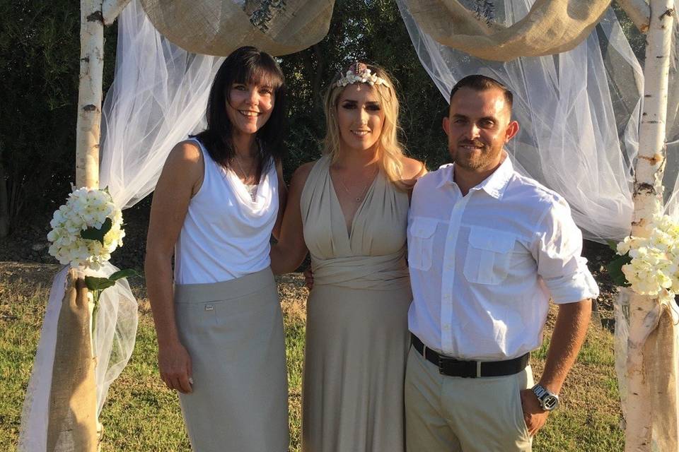 Officiant and the newlyweds
