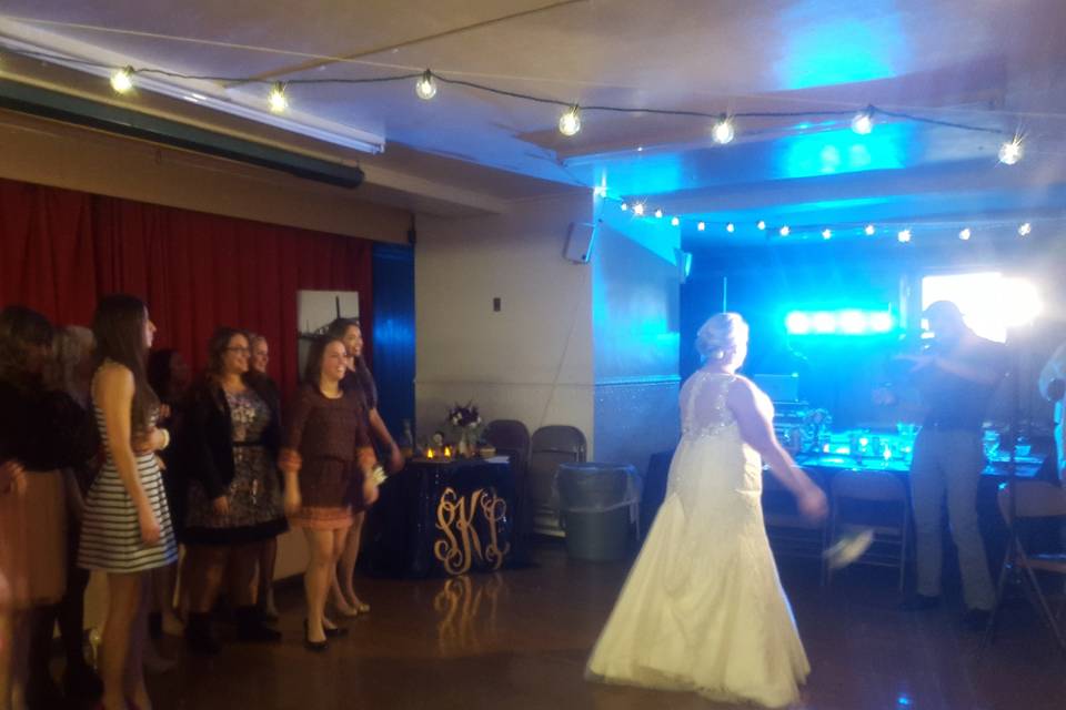 The bouquet toss is always a highly anticipated event!