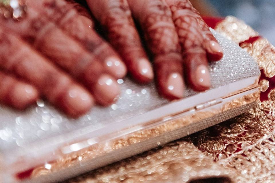 Bride holds book in ceremony
